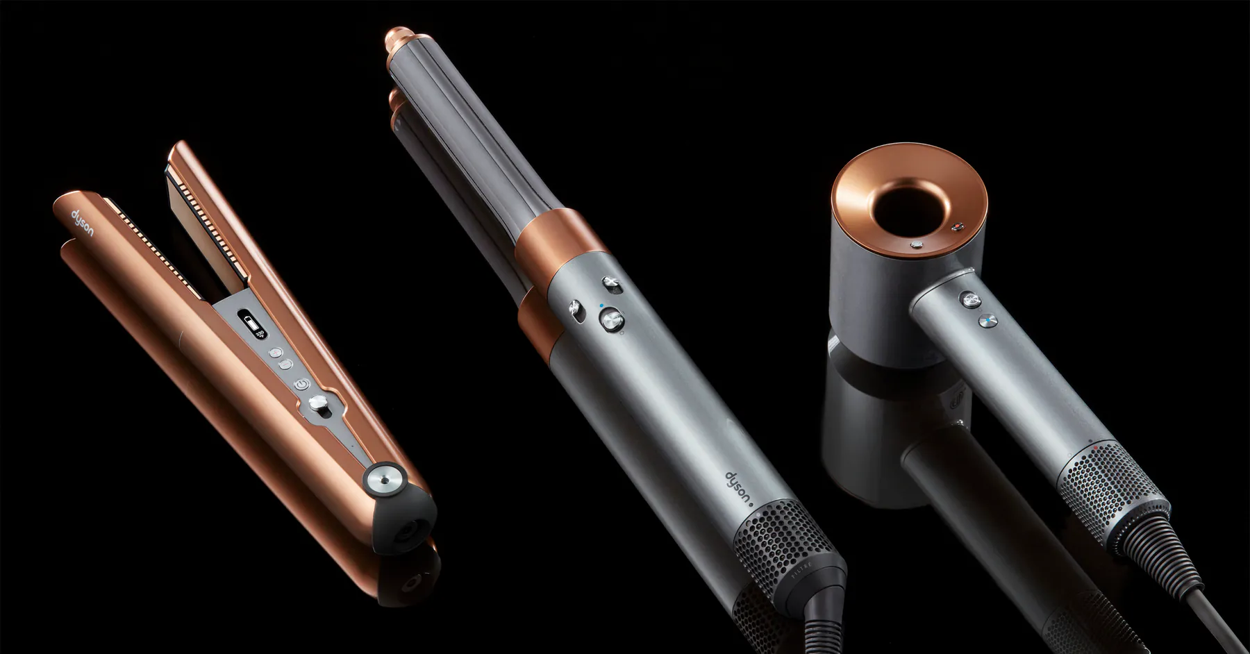 Dyson beauty product campaign: Corrale, Airwrap, and Supersonic on black.